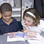 Propel East students reading a book